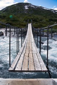 A bridge over a wild river