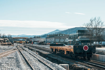 Railroad tracks against clear sky