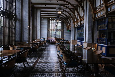 Large interior of a moody dinning area hall no people