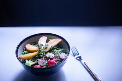 High angle view of salad in bowl on table