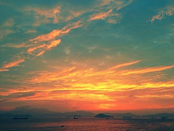 Scenic view of sea against dramatic sky