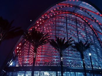 Low angle view of illuminated modern building