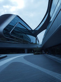 Modern bridge against sky in city