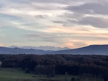 Scenic view of mountains against sky during sunset