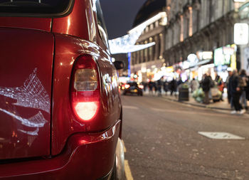 Close-up of traffic on road in city