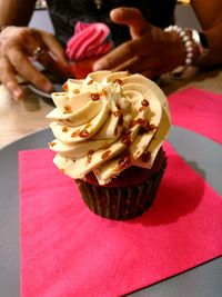 Close-up of cupcake on table