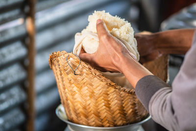 Close-up of hand holding ice cream