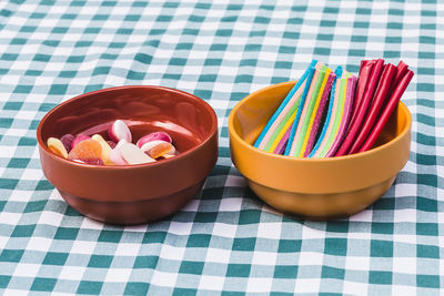 High angle view of multi colored candies on table