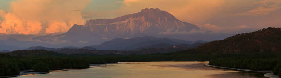 Scenic view of mountains against sky during sunset