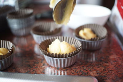 Close-up of cupcakes on table