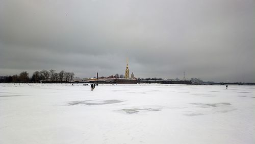 View of city on snow covered landscape