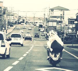 Woman standing on city street