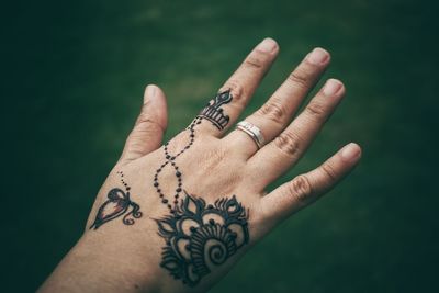 Close-up of woman hand with text