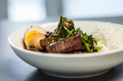 Close-up of food in plate on table