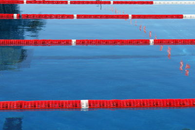 High angle view of red swimming lane markers