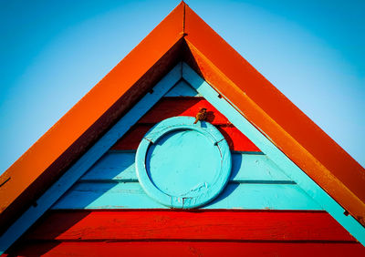 Low angle view of building against blue sky