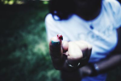 Close-up of woman hand holding ring