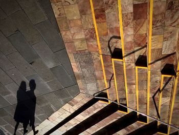 Shadow of woman on wall