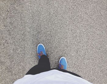 Man walking on concrete