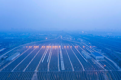 High angle view of light trails on road in city