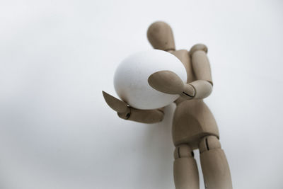 Close-up of stuffed toy against white background