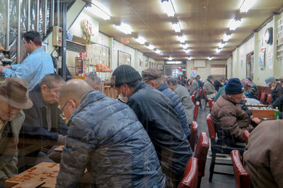 Group of people in market