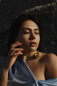 Portrait of a young woman looking away