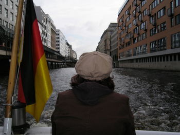 Woman standing in front of building