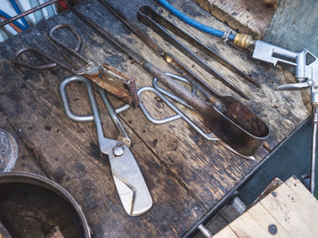 Shear scissors. shaping diamond shear cutter and pliers on a glassblower metal table