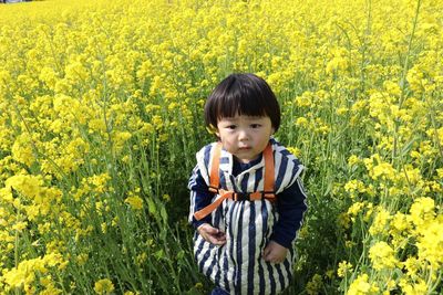 Portrait of girl on field