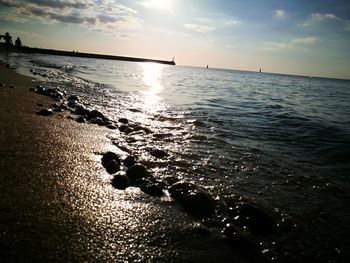 Scenic view of sea against sky during sunset