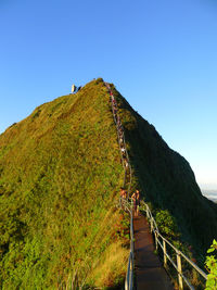 Scenic view of mountain against clear blue sky