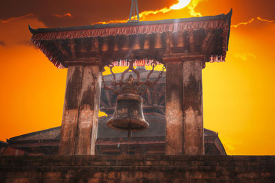 Statue against sky during sunset