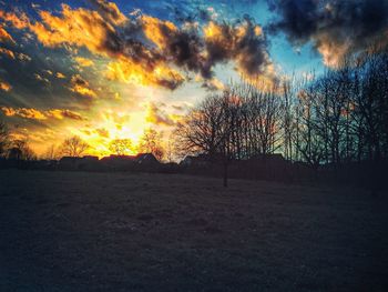 Scenic view of landscape against cloudy sky