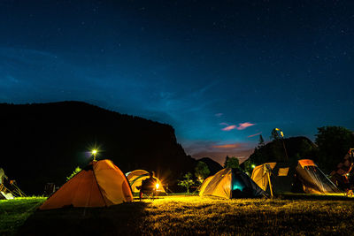 Campsite at night with stars in the sky