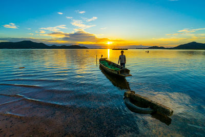 Scenic view of sea against sky during sunset