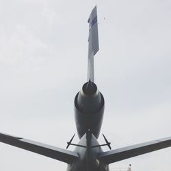 Cropped image of military airplane against sky