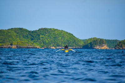 Scenic view of sea against clear sky