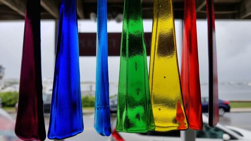 Close-up of multi colored glass hanging