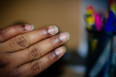 Close-up of hand holding hands