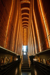 Low angle view of illuminated escalator