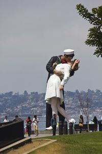 Unconditional surrender love sculpture in san diego through people