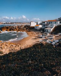 High angle view of boats on beach against sky