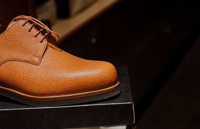 Close-up of shoes on table