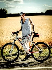 Man riding bicycle on road