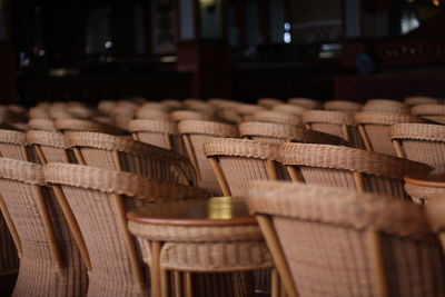 Close-up of chairs in wicker basket