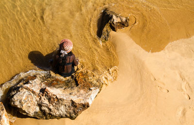 Woman standing on beach