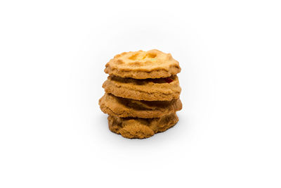 Close-up of cookies against white background