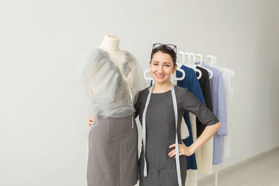 Smiling woman standing in a store