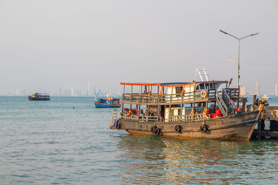 A wooden fisherman's boat at the fishing pier in bang saray district chonburi thailand asia